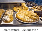 Traditional dessert for sale at showcase in Cordoba, Spain