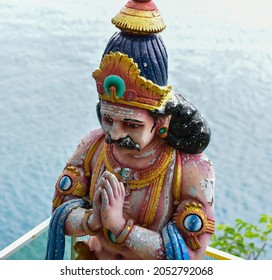 Traditional Deva Statue with Water Background with blur