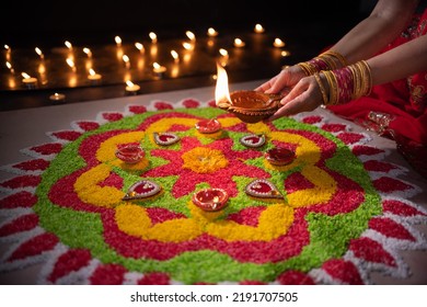 Traditional diya lamps lit during diwali celebration - Shutterstock ID 2191707505
