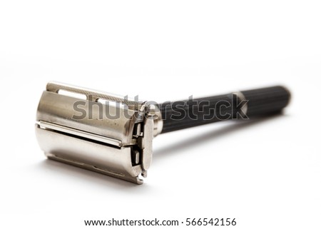 Traditional double edge safety razor isolated on white background