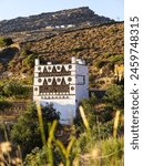 Traditional dovecote on the cycladic island of Tinos. The dovecotes are one of the top symbols of the island of Tinos. 