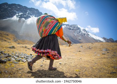 Traditional Dressed Quechua Woman In The Andes