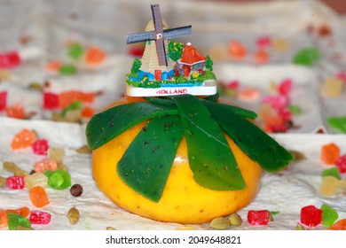 Traditional Dutch Cheese Collection And A Windmill (souvenir - Fridge Magnet). Leyden And Groene Pesto. Made In The Netherlands Close Up.