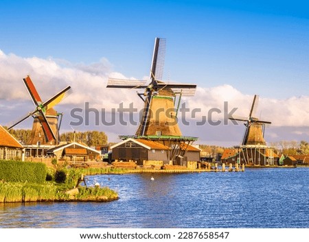 Traditional Dutch windmills in the rural landscape of Zaanse Schans