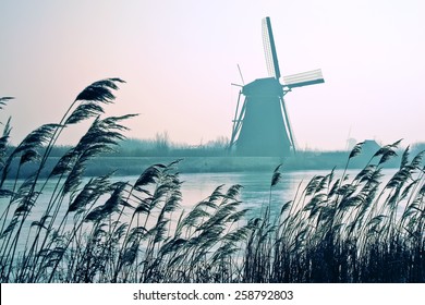 Traditional Dutch windmills in winter at Kinderdijk, Netherlands