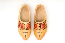 Traditional Dutch Wooden Clogs Isolated On The White Background