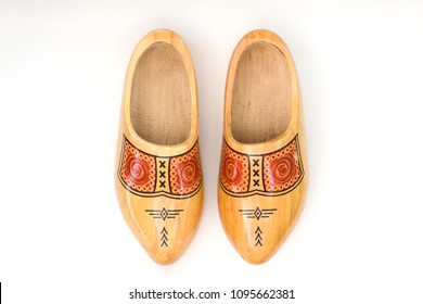 Traditional dutch wooden clogs isolated on the white background