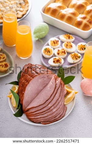 Traditional Easter ham on the table served with Easter brunch