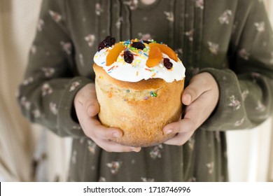 Traditional Easter Hot Cross Buns. Little Girl Holding Round Bread. Hands Holding Big Bread.