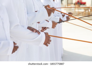 Traditional Emirati Al Ayalah Male Dance, UAE Heritage, Hands In Frame