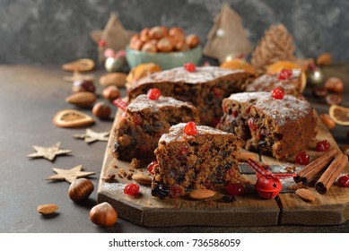 Traditional English Christmas Fruit Cake On A Gray Background