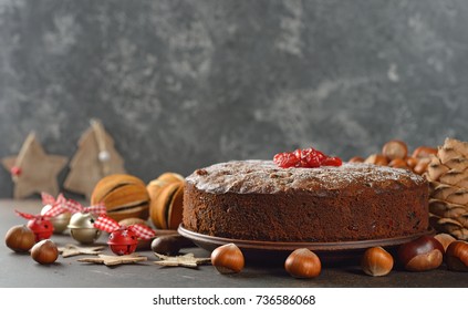 Traditional English Christmas Fruit Cake On A Gray Background