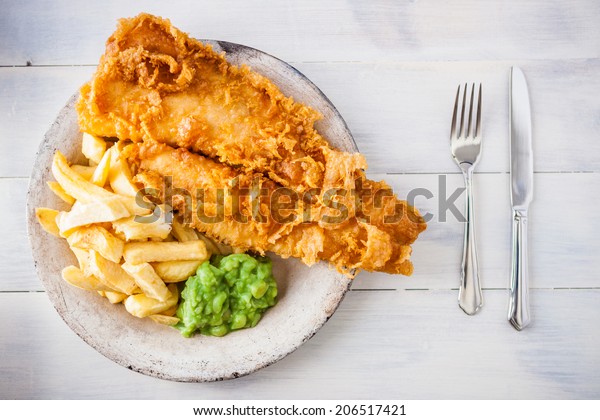 Traditional\
English food - Fish and chips with mushy\
peas