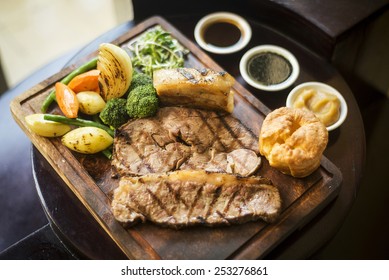 Traditional English Food Sunday Roast Lunch In Cozy Restaurant Pub