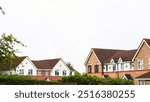 Traditional English house brick roofs, suburban area.