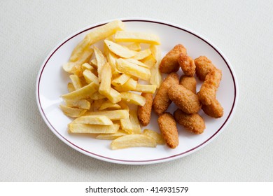 Traditional English Meal - Deep Fried Seafood, Scampi With Chips Served In Local Restaurant In Hastings, England.