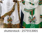 A traditional Ethiopian kemis, a white dress with colorful embroidery, worn by women during the celebration of the Jewish holiday of Sigd. 