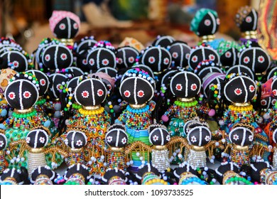 Traditional Ethnic African Handmade Dolls With Multicolored Bead Decoration At Local Market In Cape Town, South Africa. Souvenirs From Africa