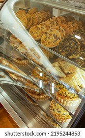 Traditional European Bakery Shop Interior, Quiche, Cake Pastry, Meet Pie, Puff In Window Display