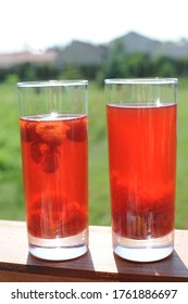 Traditional European Non-alcoholic Fruit Beverage Compote Made From Strawberries And Rhubarb In Summer