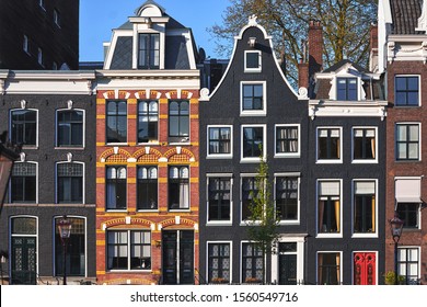 Traditional facade of dutch houses in Amsterdam