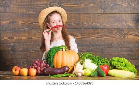 Traditional Farm Market. Child Celebrate Harvesting. Girl Kid Farm Market With Fall Harvest. Kid Farmer With Harvest Wooden Background. Family Farm Festival Concept. Farm Activities For Kids.