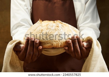 Traditional festive round loaf of bread for wedding on towel. Concept of food, health, traditions, bakery and ad