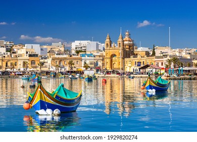 Traditional fishing boats in the Mediterranean Village Marsaxlokk  Malta