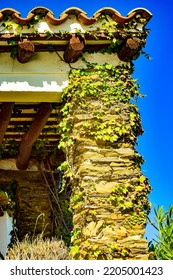 Cadaqués Traditional Fishing Village With Tourists Of Mediterranean Coast, White Town Where The Painter Salvador Dalí Lived, Cadaqués Near Barcelona, ​​Costa Brava, Girona, Spain.