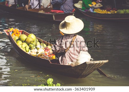 Traditional floating market in Damnoen Saduak near Bangkok