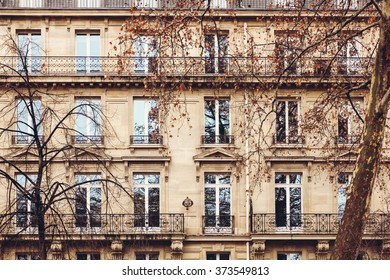 Traditional French Architecture with Typical Windows and Balconies in Paris. Autumn in France.  - Shutterstock ID 373549813