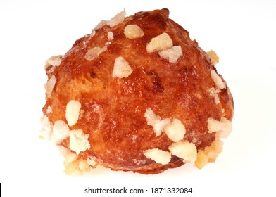 Traditional French chouquette close-up on white background 