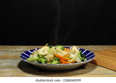 Traditional Fried Mixed Fresh Vegetable With Oyster Sauce Serving On The Plate. Famous Salad Menu In Asian Restaurant. High Fiber And Low Fat Food Menu.