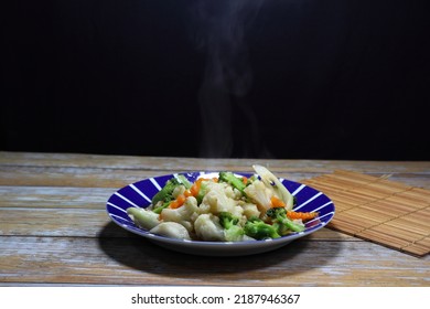 Traditional Fried Mixed Fresh Vegetable With Oyster Sauce Serving On The Plate. Famous Salad Menu In Asian Restaurant. High Fiber And Low Fat Food Menu.