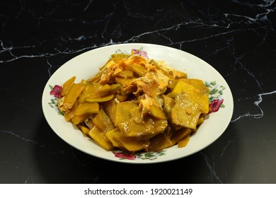 Traditional Fried And Stirred Fresh Sliced Pumpkin Meat With Egg Serving On The Plate. High Fiber And Vitamin Food.