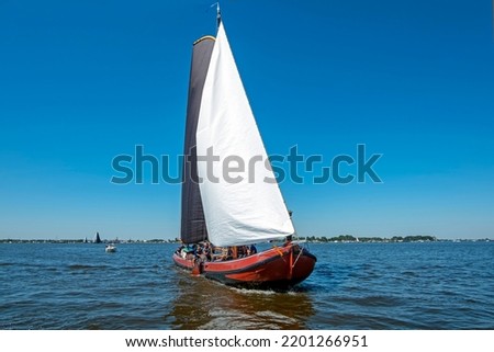 Traditional Frisian wooden sailing ship in a yearly competition in the Netherlands