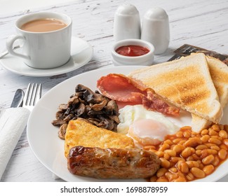 Traditional Full English Breakfast With Toast And Tea 