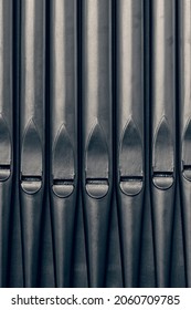 Traditional generic grey metal pipe organ pipes. - Shutterstock ID 2060709785