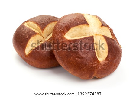 Traditional German laugenbrot. Bavarian homemade bretzel rolls lye bread, close-up, isolated on white background.
