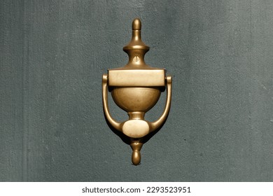 traditional golden door knocker object