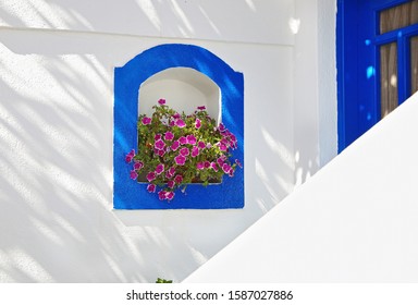 Traditional Greek House With Blue Details And Flowers At Ano Koufonisi Island Cyclades Greece