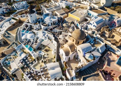 Traditional Greek White Buildings In Oia, Santorini Island. Aerial Drone View