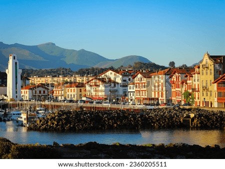 Traditional half-timbered basque houses in port of Saint Jean de Luz, Nouvelle-Aquitaine, France