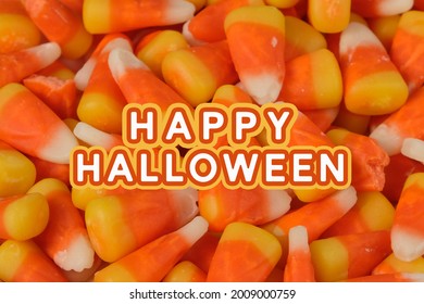 Traditional Halloween Candy Corn Closeup As Pattern Background With Holiday Text.