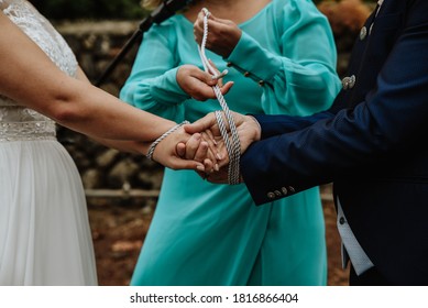 A traditional handfasting ceremony during the wedding