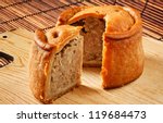 A traditional handmade pork pie traditionally called Melton Pies from the town of Melton Mowbray in the Midlands, England