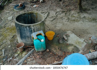 Traditional Of Having A Water In Malaysian Village. Through A Well With A Bucket