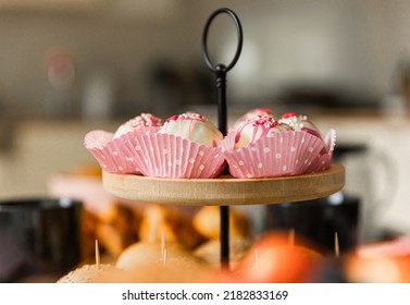 Traditional High Tea With Different Kind Of Cakes And Sweet Treats. Blueberries, Cake, Macarons, Strawberries And More. 