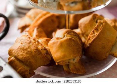 Traditional High Tea With Different Kind Of Cakes And Sweet Treats. Blueberries, Cake, Macarons, Strawberries And More. 