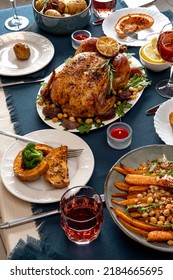 Traditional Holiday Dinner For Celebration Thanksgiving. Baked Chicken, Potatoes And Sides. Family Party Or Gathering. Fall Table Setting. Top View Table Scene